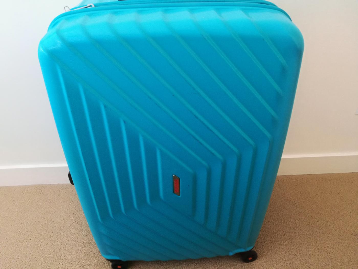 アメリカン・エクスプレスのスーツケース「エアフォースワン」水色96．5L７６cm